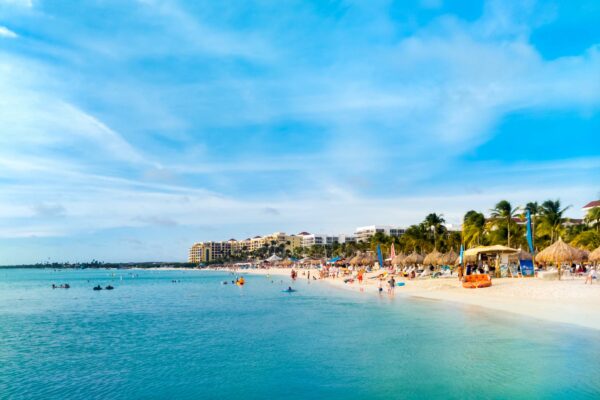 Sandy,Beach,In,The,High,Rise,Hotel,Area,,Aruba.,Unrecognizable